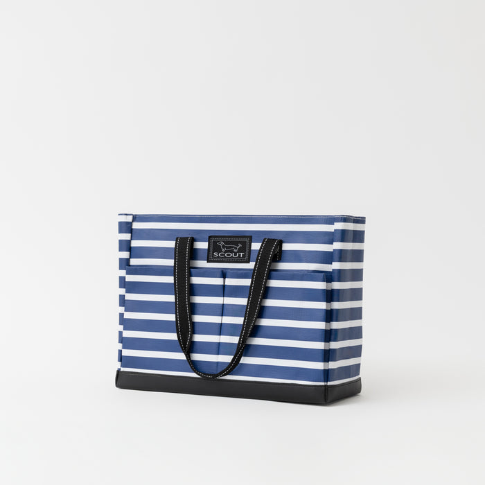 Blue and white striped tote bag with a black handle on a light gray background
