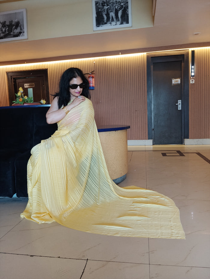Yellow flowy saree