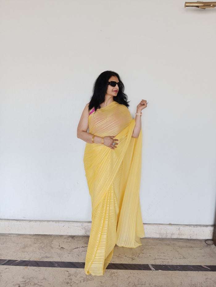 Yellow flowy saree