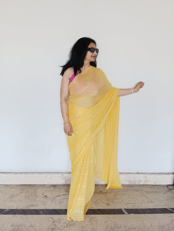 Yellow flowy saree
