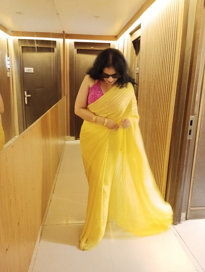 Yellow flowy saree