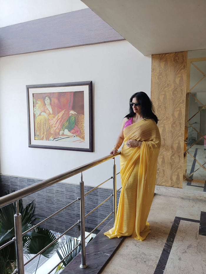 Yellow flowy saree