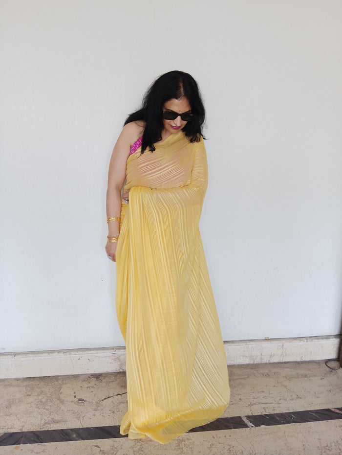 Yellow flowy saree