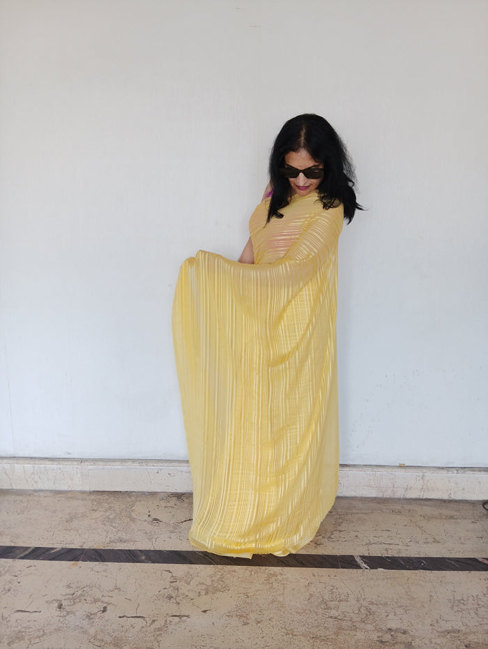 Yellow flowy saree